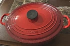 Creuset 29 Sgnture Cast Iron Oval Casserole Dish, Lid Flame Red Black Inside New. Price: $150.00.