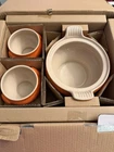 In Box Le Creuset Stoneware Volcanic/flame Soup Tureen W/4 Bowls. Price: $400.00.