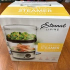 New Eternal Living Two Tier Food Steamer W/lids Stackable 8" X 5 Quart Nib. Price: $19.99.