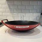 New Creuset Stovetop Wok Fry Pan Cast Iron W/ Glass Lid. Damage Handle.. Price: $179.00.