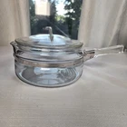 Vintage Pyrex Stovetop Flameware Clear Glass 1.5 Quart Saucepan With Lid Used. Price: $35.00.