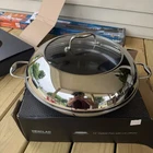 Hexclad Hybrid Nonstick 14-INCH Frying Pan With Steel Lid Used. Price: $124.95.