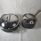Farberware 2QT And 3/4QT Stainless Steel Heavy Duty Pans Lids See Photos Used. Price: $29.99.