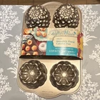 The Pioneer Woman Timeless Aluminum Nonstick 6-CAVITY Floral Cakelet Pan Gray New. Price: $11.98.