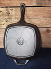 Lodge Cast Iron 10.5" Seasoned Square Grill Pan/ 8SGP-2 Used. Price: $24.00.