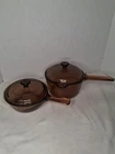 Corning Visions Amber Saucepan Pot Spout 1L And .5L With Lids 4PC Set Used. Price: $32.00.