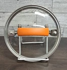 6" Glass Stainless Steel Pot Lid With Orange Rubber Coated Handle Rachael Ray Used. Price: $10.00.
