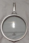 Calphalon Premier Space Saving Flat Glass Lid For 8" Skillet Used. Price: $10.00.