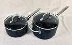 Calphalon 2.5- Or 4.5-QUART Anodized Aluminum Long Handle Pots W/ Glass Lids Used. Price: $48.00.