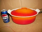 Vintage Creuset Enameled Oval Cast Iron Dutch Oven #26 #28 Flame Orange Used. Price: $79.99.