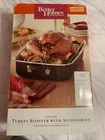 Better Homes & Gardens Enamel On Steel Turkey Roaster W/ Accessories New. Price: $27.89.