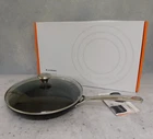 Le Creuset Toughened Nonstick Pro Fry Pan With Glass Lid, 12 Inch - New. Price: $189.95.