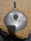 Magnalite 10 1/4" Frying Pan Skillet With Lid, Double Spout And Steaming Tray Used. Price: $110.00.