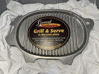Wilton Armetale Gourmet Grillware Pig Griller New Aluminum Alloy 1000 Degrees F. Price: $64.99.