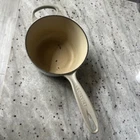 Used Le Creuset Signature Cast Iron 1.75 Quart Saucepan Mushroom. Price: $65.00.