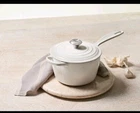 Creuset Signature Enameled Iron Cast Saucepan 1.75 Qt White Open. Price: $179.00.