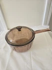 Vision Corningware 1.5 Liter Ribbed Saucepan With Lid Amber Glass Vintage Used. Price: $45.00.