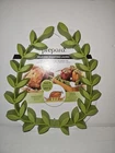 Brand New Prepara Flexible Silicone Roasting Laurel - Meat & Poultry Rack. Price: $19.99.