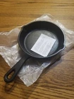 Steelite Genware. New. 9 3/4" Total Length. 6" Cooking Surface. Cast Iron. T1. Price: $25.00.