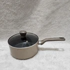 3 Qt T-fal Nonstick Saucepan With Glass Lid 7.5" Wide Long Handle Round Beige Used. Price: $15.00.