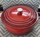 Le Creuset 13.25 Round Dutch Oven. Cerise Color. Used. Price: $395.00.
