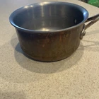 Calphalon 1.5 Quart Copper And Stainless Steel Pot Sauce Pan Mo. 87012 Used. Price: $29.99.