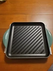 Le Creuset Signature Cast Iron 9.5 Inch Square Grill--green New. Price: $94.00.