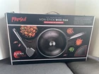 Parini 12.5" Stainless Steel Non-stick Wok Pan W/glass Lid & Spatula *brand New*. Price: $25.99.