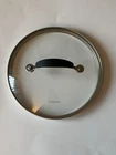 Cuisinart 7.5" Tempered Glass Replacement Lid - Fits 2QT / 3QT Pots Used. Price: $15.00.