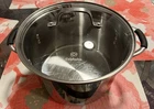 Calphalon Stainless Steel 8 Quart Sauce Pot W/glass Lid Plus Steamer Used. Price: $35.00.