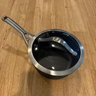 Calphalon Aluminum 1/2 Qt Anodized Sauce Pan Glass Lid Never Used New. Price: $44.99.