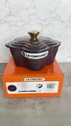 Le Creuset Cast Iron Flower Cocotte Fig 20 Gold Knob Black Interior New. Price: $429.99.