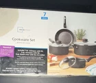Mainstays Nonstick Cookware Set Black Seven-piece Saucepan Dutch Oven Skillet New. Price: $12.00.