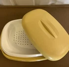 Vintage Tupperware Microwave Steamer Set Harvest Gold Great Condition Used. Price: $15.00.