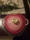 Le Creuset Shallow Heart Cocotte With Gold Knob In Berry New. Price: $700.00.