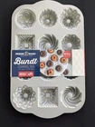 Nordic Ware Bundt Charms Pan Nip 1.2 Cups New. Price: $29.95.