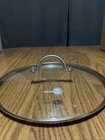 Greenpan Glass Lid With Temper Stainless Steel Handle, 8" Used. Price: $12.00.