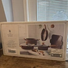 The Pioneer Woman Prairie Signature 14-PIECE Cast Aluminum Cookware Set, Brown New. Price: $89.95.