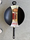 New T-fal Easy Care Nonstick Wok, 14.25 Inch, Grey Handles. Price: $32.53.