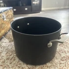 Kirkland 8 Qt Non-stick Hard Anodized 7.5 Saucepan With Strainer Lid Used. Price: $20.00.