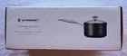 Le Creuset Nonstick Pro 2-QT Saucepan With Glass Lid New In Box. Price: $125.00.