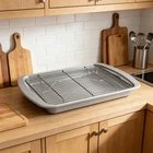 Nib Nordic Ware Aluminum Bacon Baking Pan With Nesting Rack 13X17 New. Price: $16.88.
