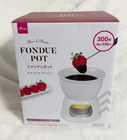 Daiso, Choco And Cheese Mini Brown Ceramic Fondue Pot With Box New. Price: $14.00.