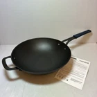 Tramontina 12.5" Carbon Steel Pre-seasoned Wok With Original Box, #1665845 Used. Price: $28.50.