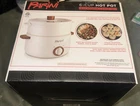 Parini 6 Cup Hot Pot Removable Steam Tray Soup Ramen Electric Nonstick Nib. New. Price: $38.50.