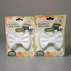 Set Of 4 Pantry New York City Cooking Pot Silicone Handle Holders White Bows. Price: $16.88.