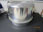 Back Basics 7 Qt. Aluminum Steam Canner W/rack 400A, Includes Tools, Box Used. Price: $15.00.