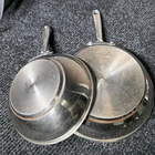 Emeril Stainless Steel Frying Set, Two-piece Silver, 8 & 10 Round Used. Price: $70.00.
