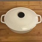 Cuisinart Enameled Cast Iron Oval Casserole Dish W/ Lid 5.5 Qt CI755-30 Used. Price: $35.00.