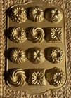 Nordic Ware Mini Bundt Charms Pan Cast Aluminum Non-stick Coating New. Price: $25.00.
